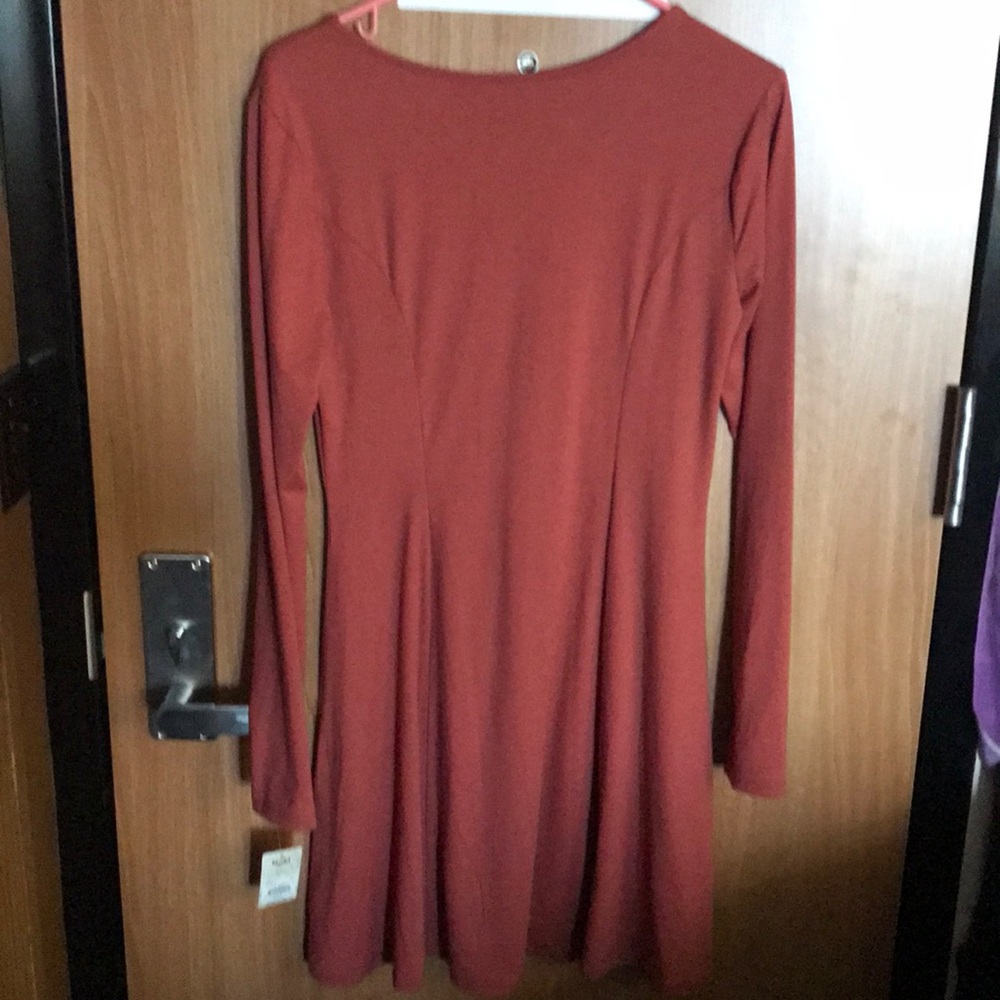 This is a NEW dress. The tags are still on! - Picture 3 of 3